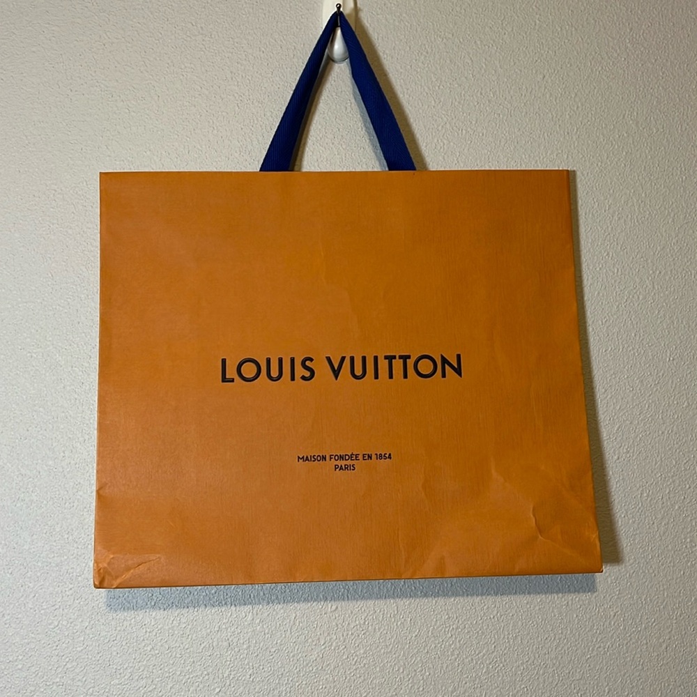 Louis Vuitton large shopping bag. Has some wrinkles